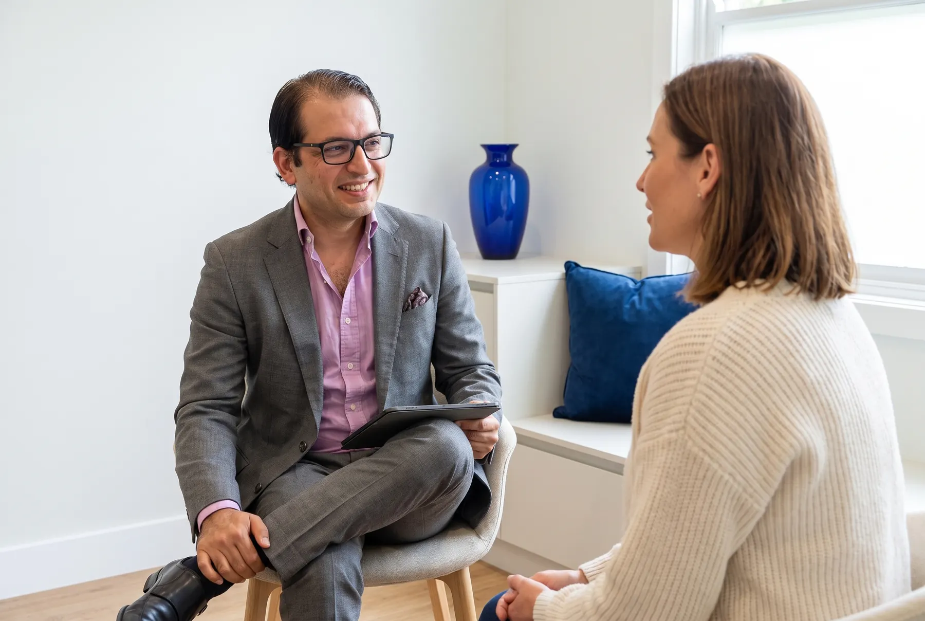 Dr Khan answering a patient's questions